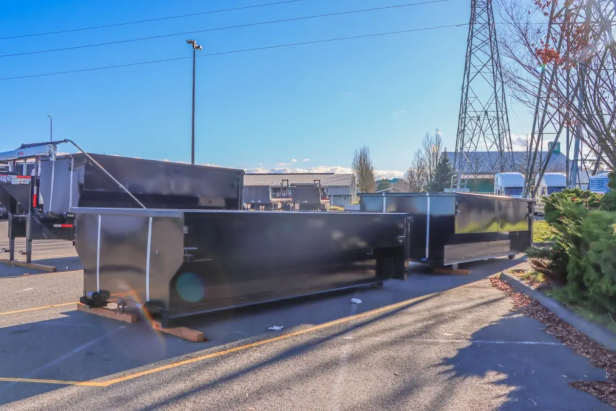 Roll-off dumpster ready for waste disposal at job site for Demolition Dumpster Rental in West Pleasant View